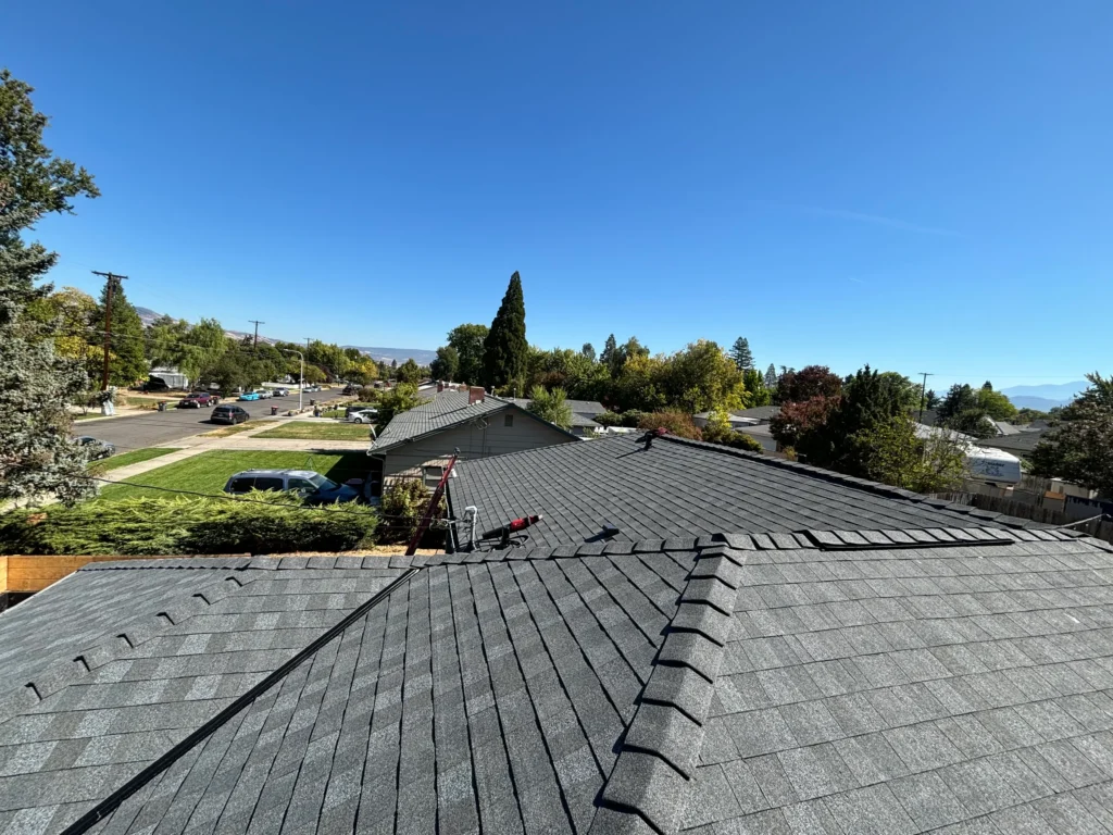 Architectural shingle roof with intersecting hips and ridges