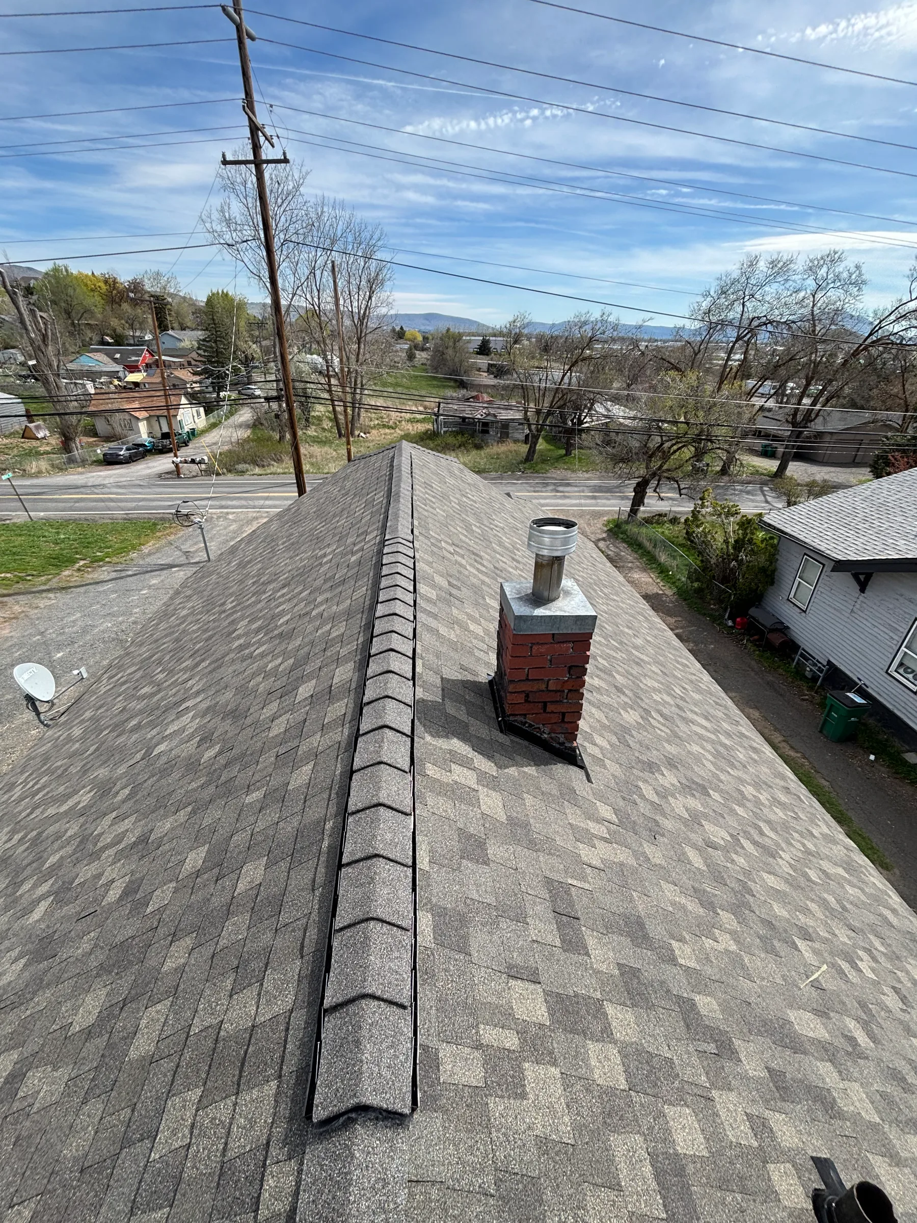 Shingle roof ridge and roof flashing detail