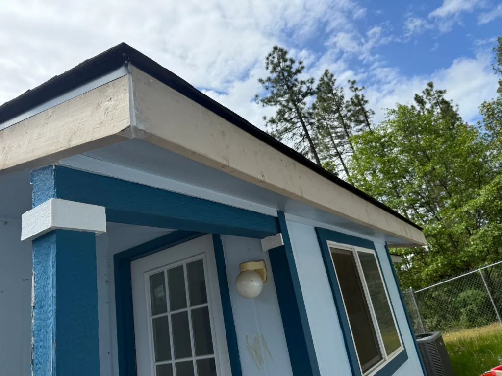 Close view of fascia boards along a residential roof edge